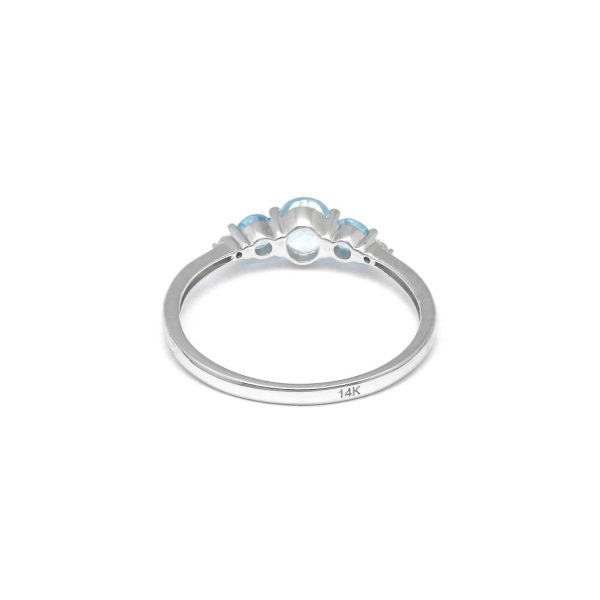 Anillo diseño especial con diamantes y topacios azules en oro blanco 14 kilates. Online