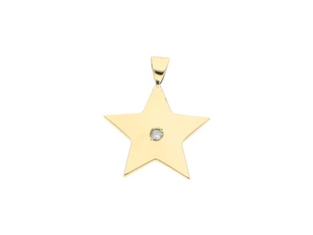 Dije liso motivo estrella con diamante en oro amarillo 18 kilates. Online Hot Sale