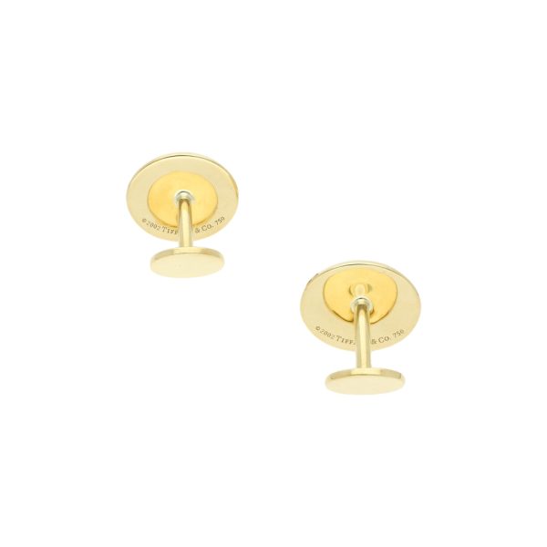 Mancuernillas lisas firma Tiffany & Co. en oro amarillo 18 kilates. Discount