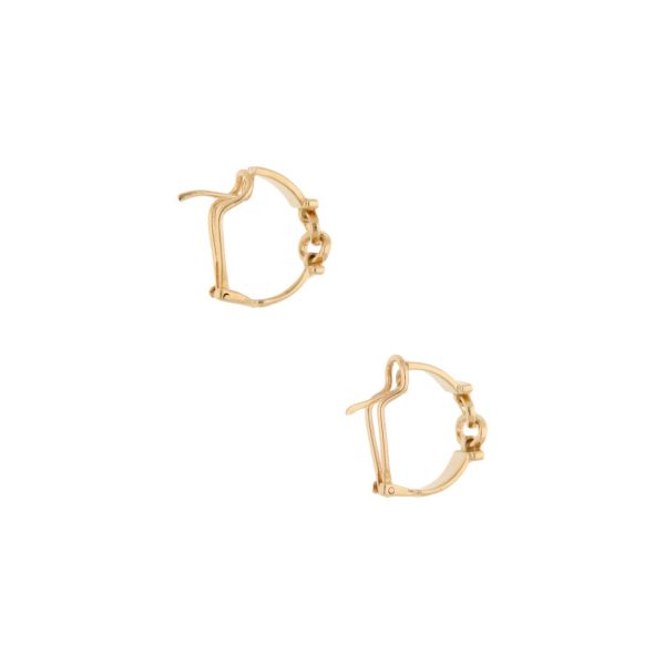 Aretes calados con diamantes en oro amarillo 14 kilates. Fashion