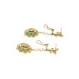 Aretes calados con jade en oro amarillo 16 kilates. Fashion