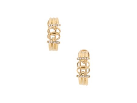 Aretes calados con diamantes en oro amarillo 14 kilates. Fashion