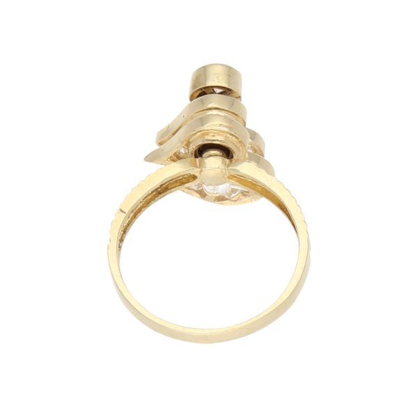 Anillo giratorio con sintéticos motivo corazón en oro amarillo 14 kilates. Sale