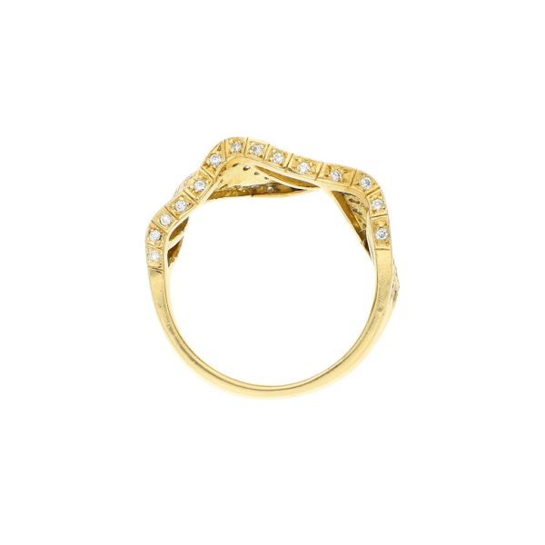 Anillo estilizado con diamantes en oro amarillo 18 kilates. Supply