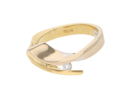 Anillo estilizado con diamante en oro dos tonos 18 kilates. Sale