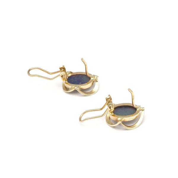 Aretes calados con ópalo en oro amarillo 14 kilates. Online now